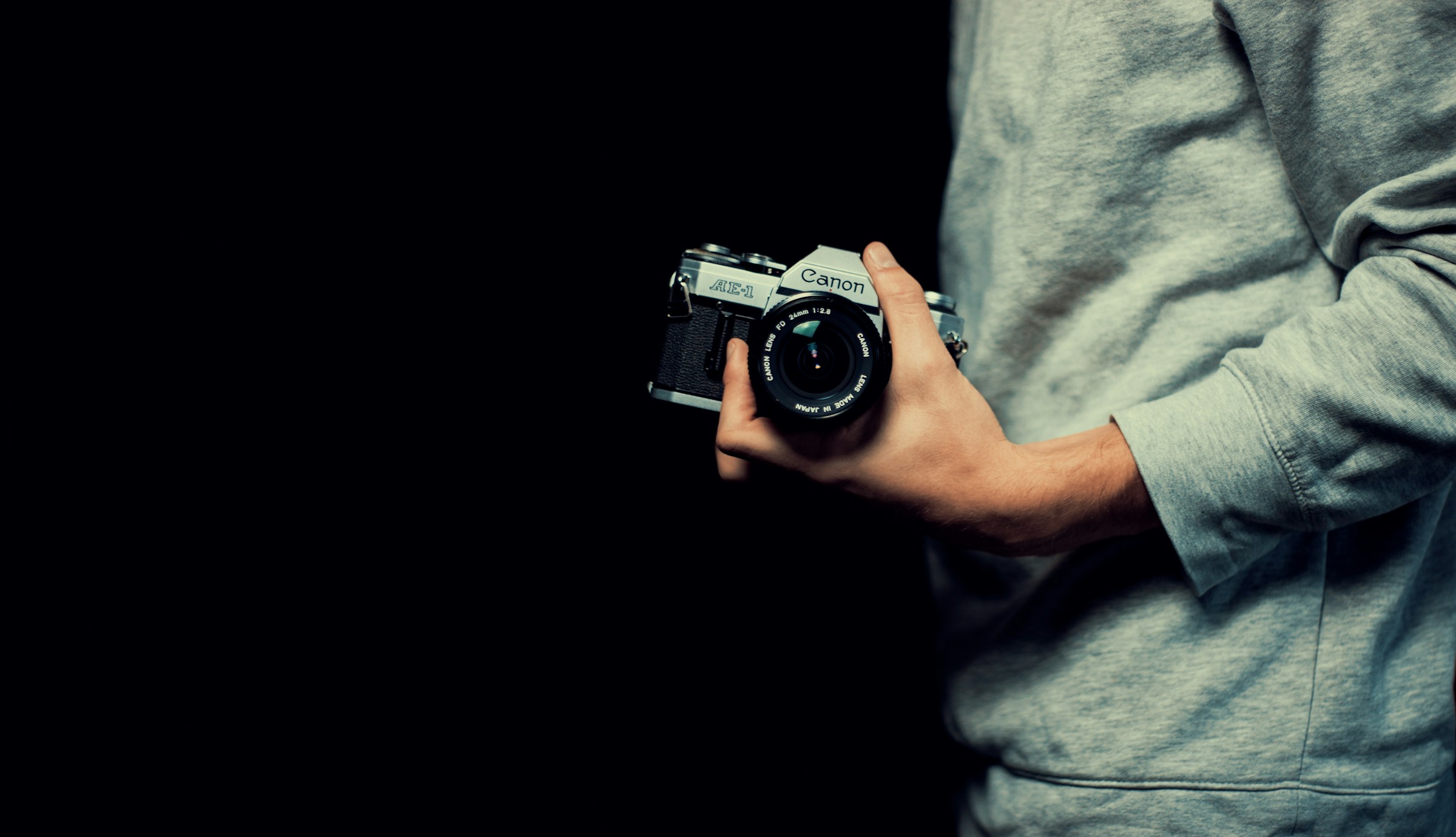 person taking his own photo - T Shirt Product Photography