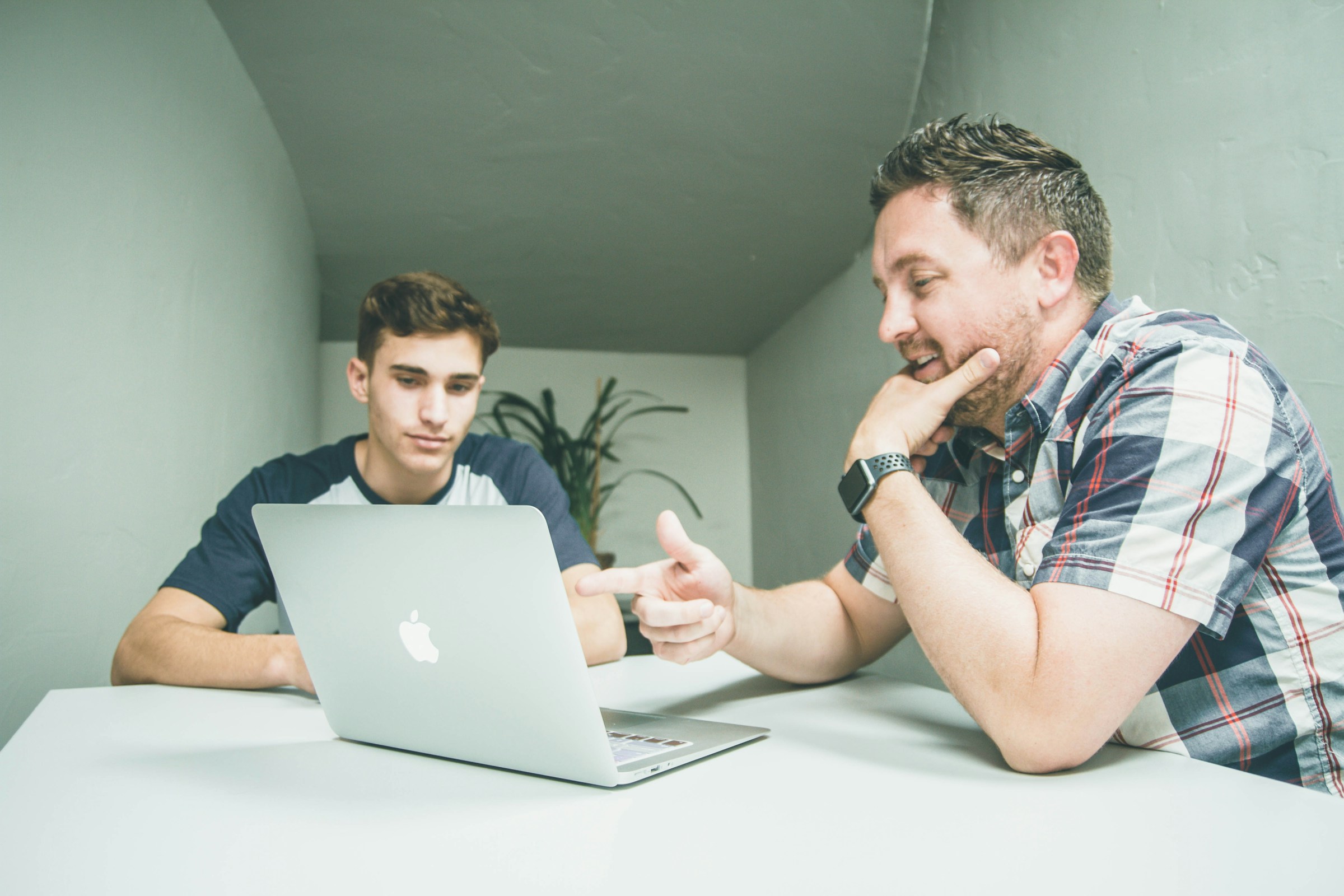 two man discussing - Product Photography Pricing