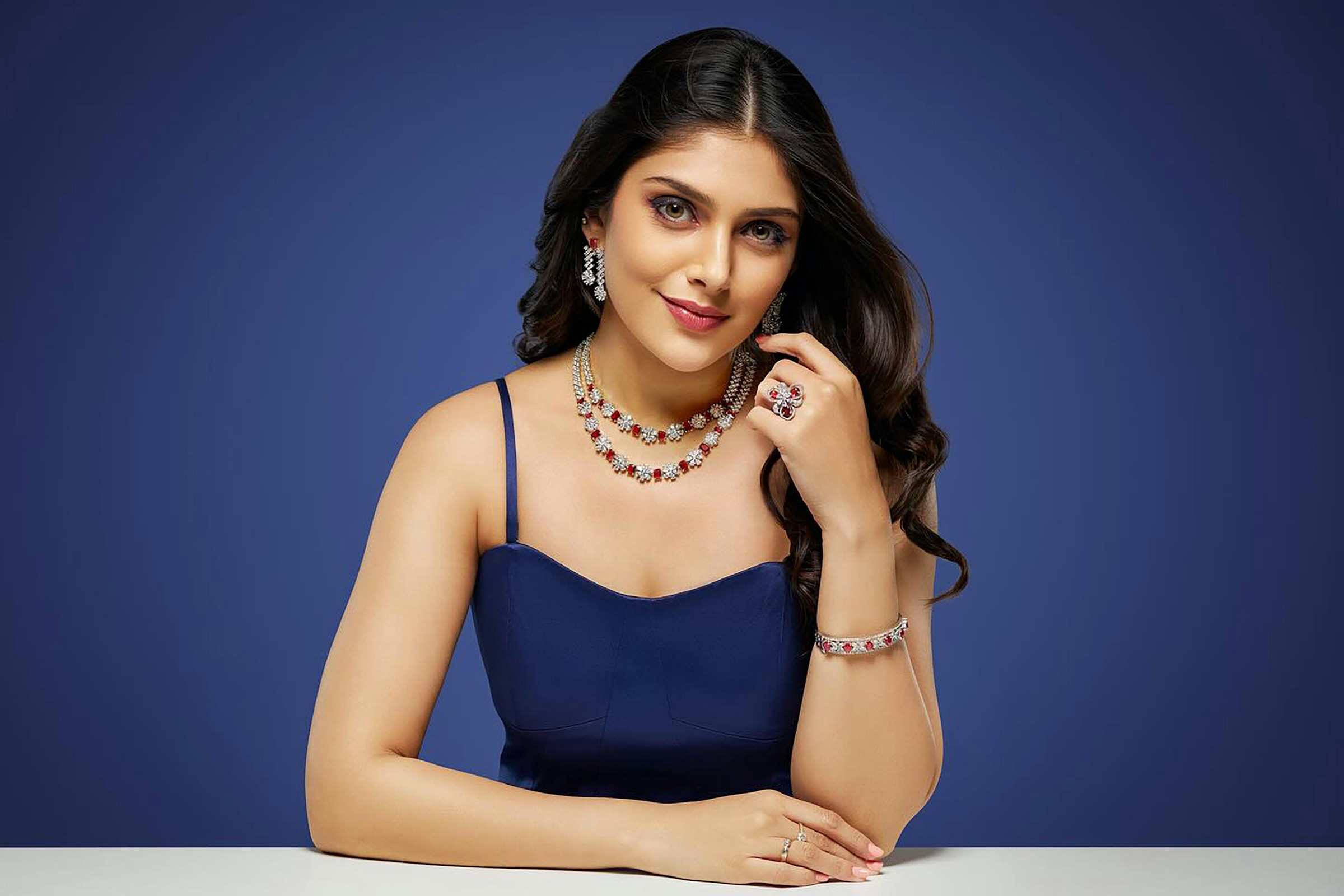 Person Wearing Jewelry Posing - Best Lens for Jewelry Photography