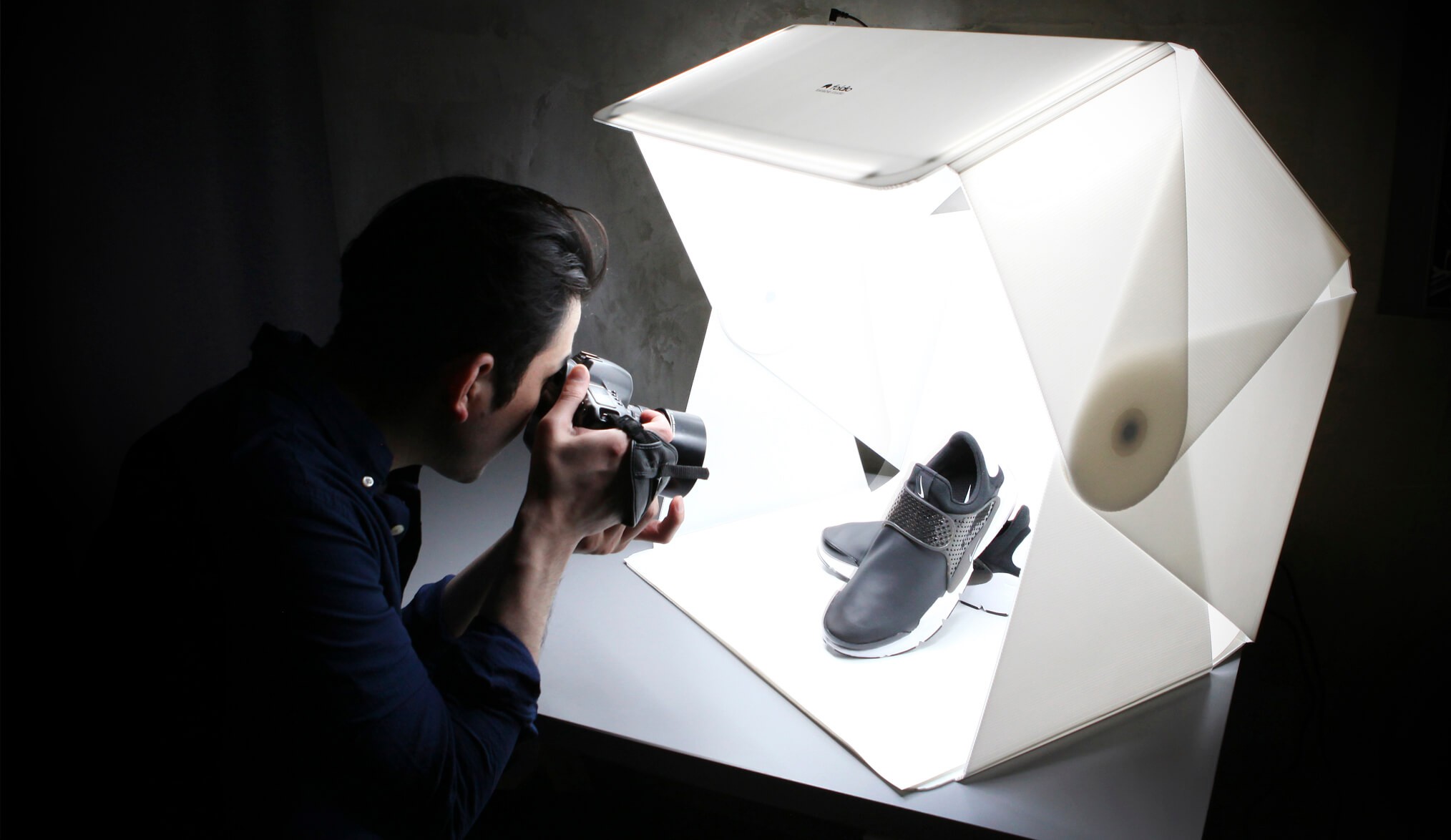 man taking pictures - Creative Product Photography Ideas At Home
