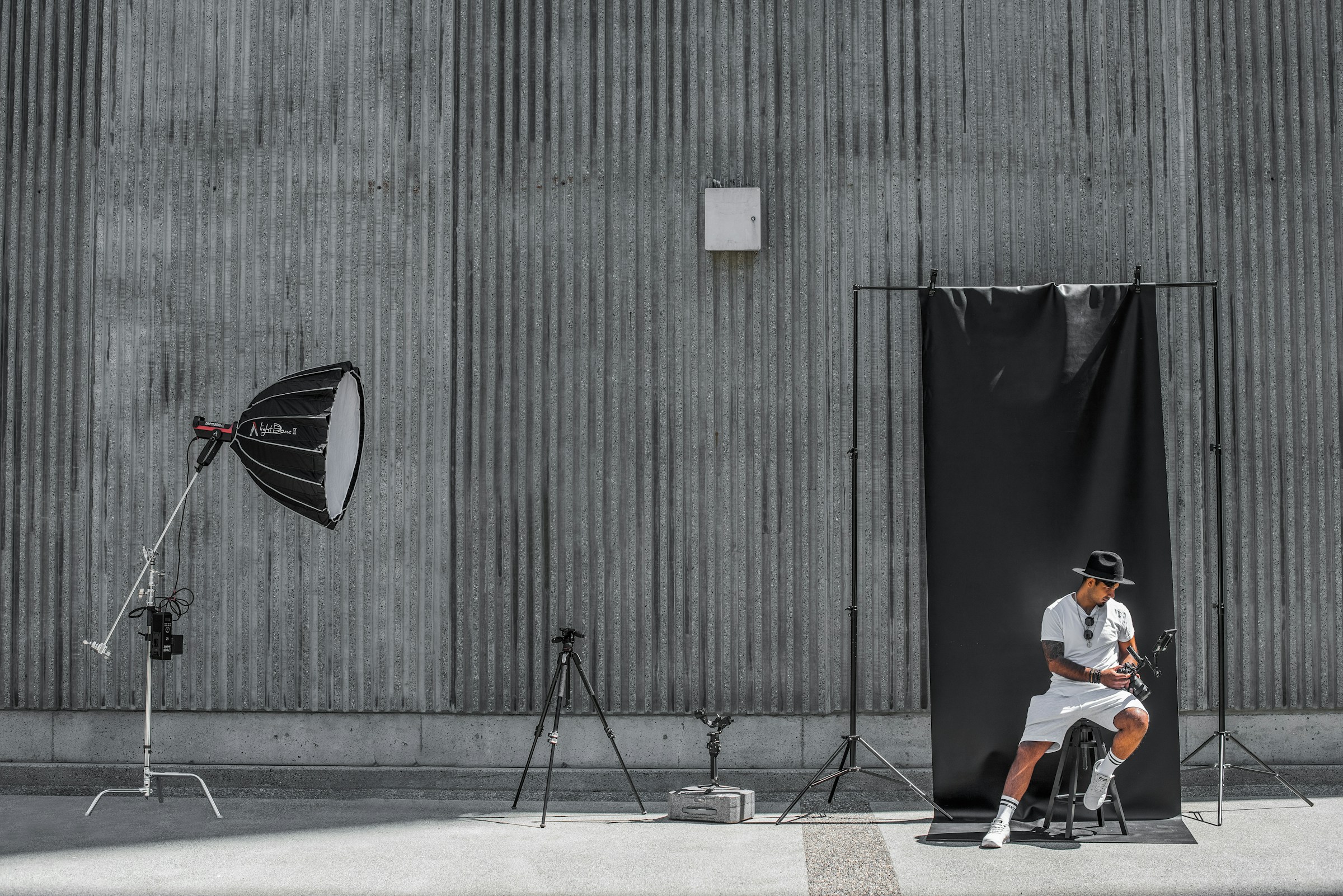 man in a photoshoot - Sunglasses Photography