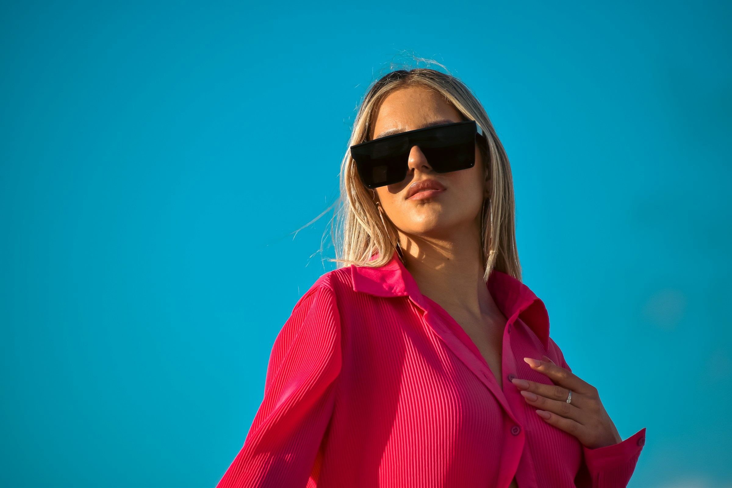 woman in pink dress - Sunglasses Photography