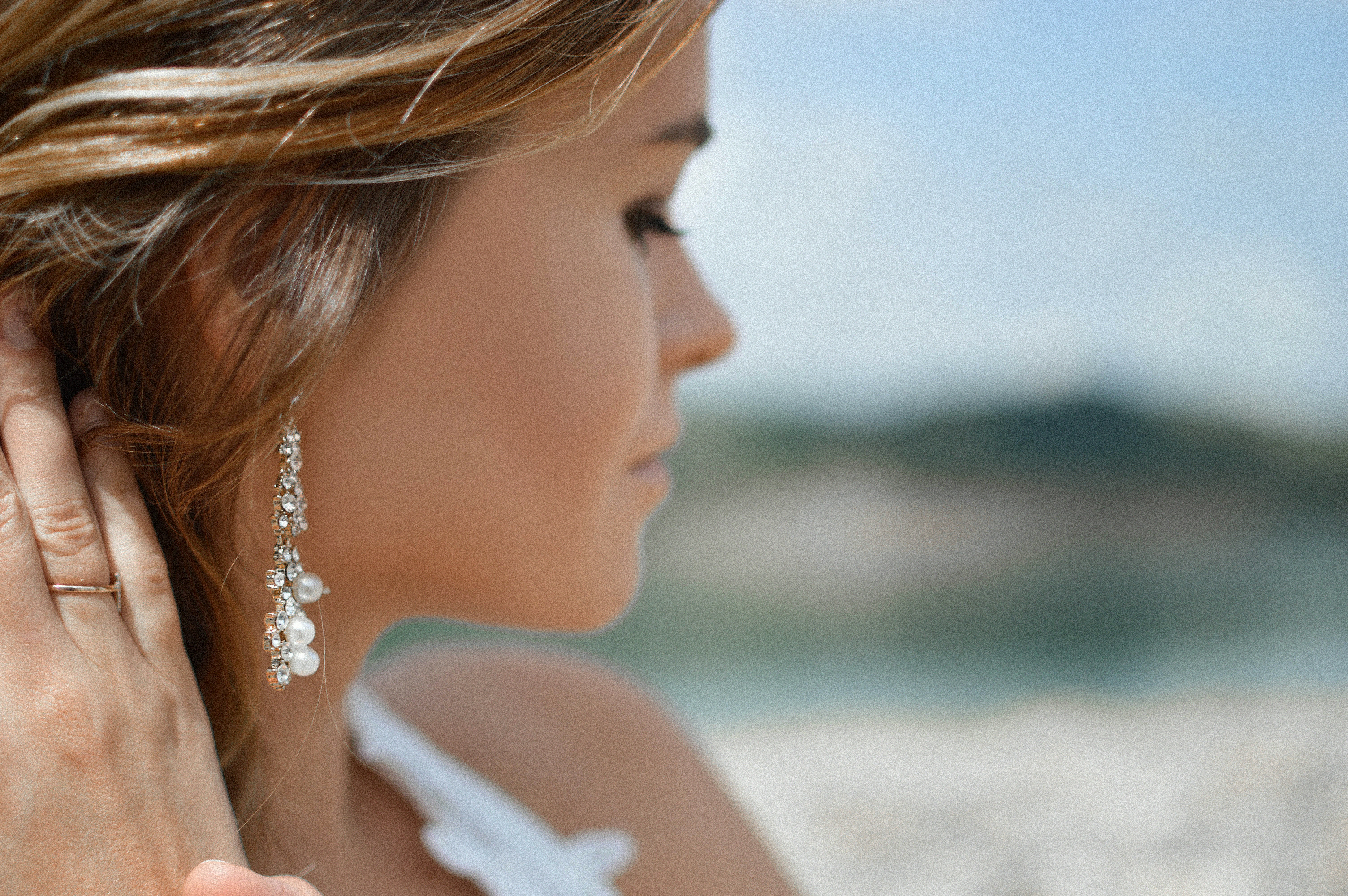woman wearing jewelry - How to Photograph Jewelry