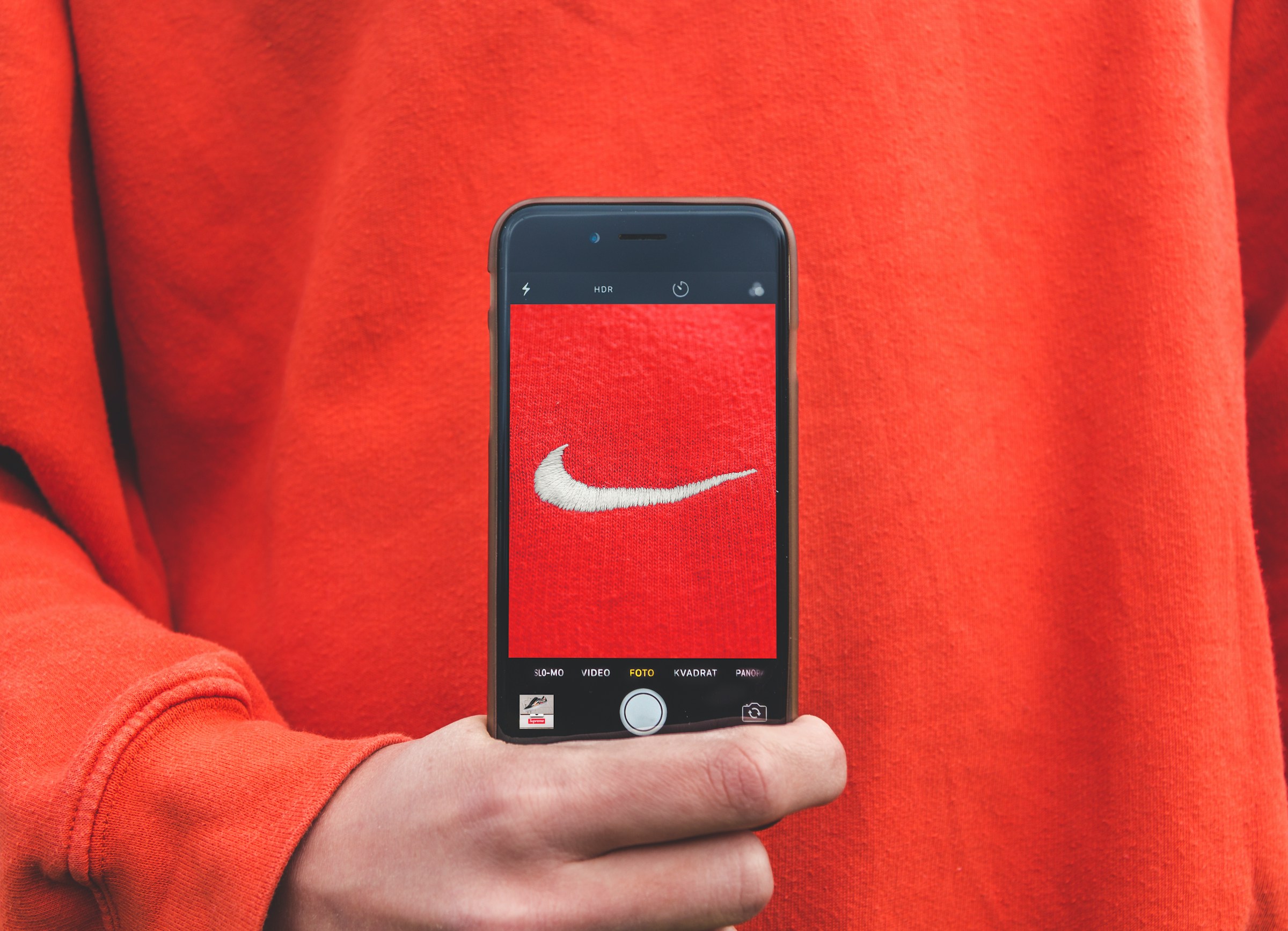 man taking a photo - Product Photography Ideas