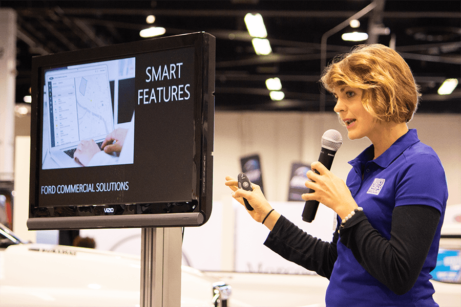 woman giving a presentation - Product Demonstration Examples 