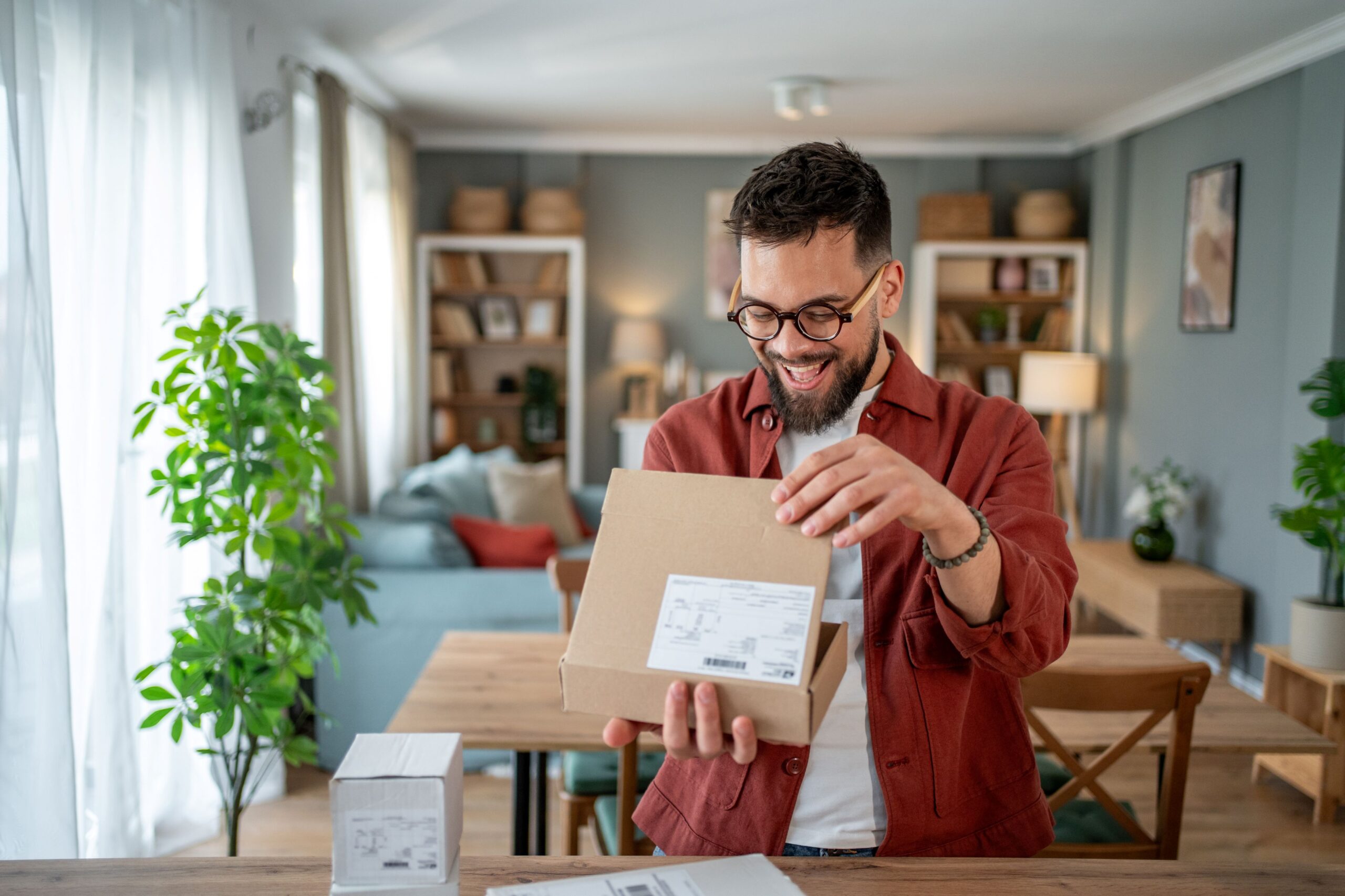 person opening box - Product Videos for eCommerce